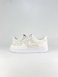 Kith x Nike Air Force 1 Low Triple White Woven Sneakers